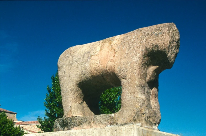 the giant, statue of a horse in a courtyard