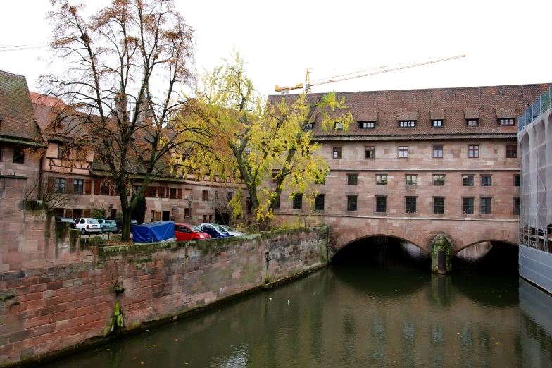 a river running between two large buildings