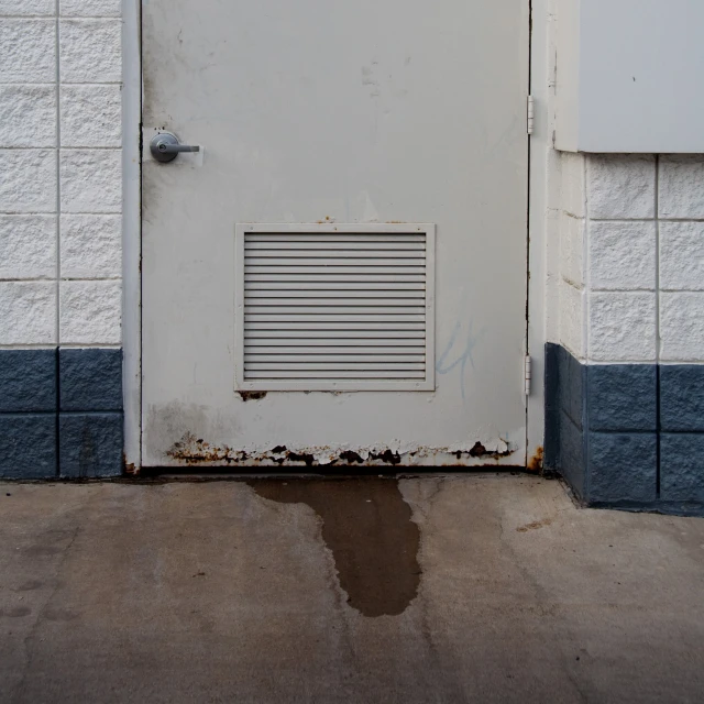 an old door with the paint peeling off