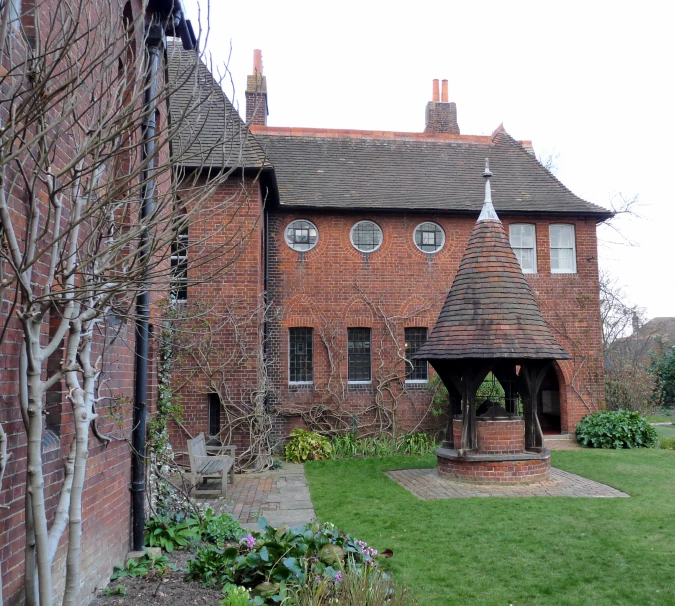 a home with an umbrella and tower in the front