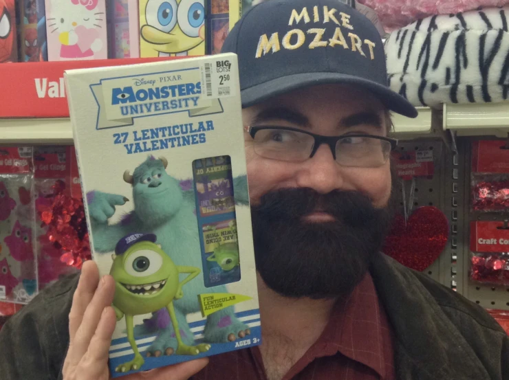 man showing monsters book at store with valentine's day sign