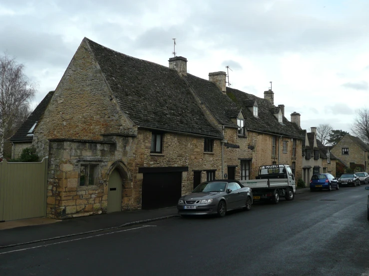 small town with very old brick houses along the street