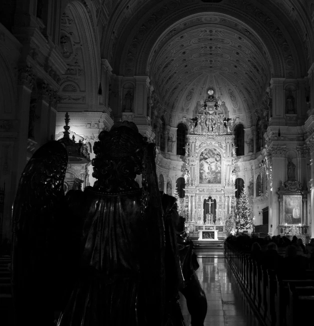 a church is lit up with christmas lights