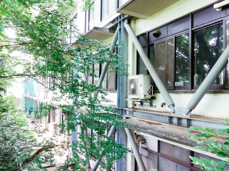 a very old run down building with an outside window