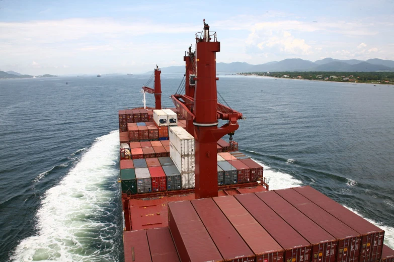 a large ship in the water moving through the ocean