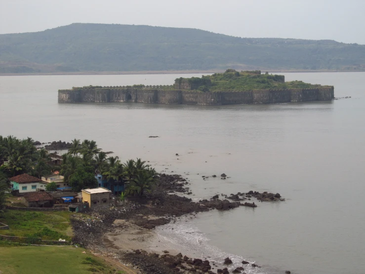 an island with a lot of small houses near the water