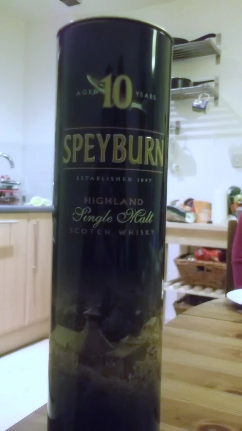 a bottle of spyburn single malk on a table