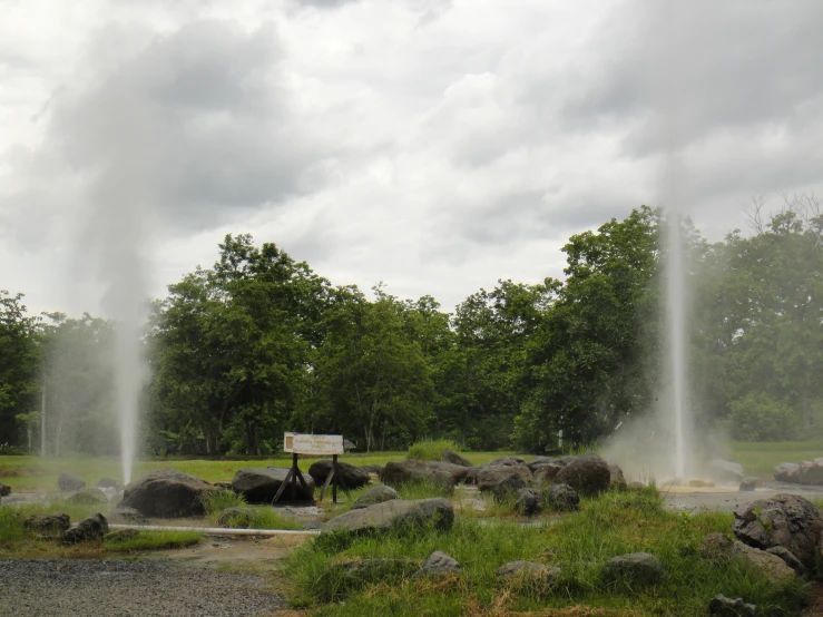 there are two fountains spewing out from the ground