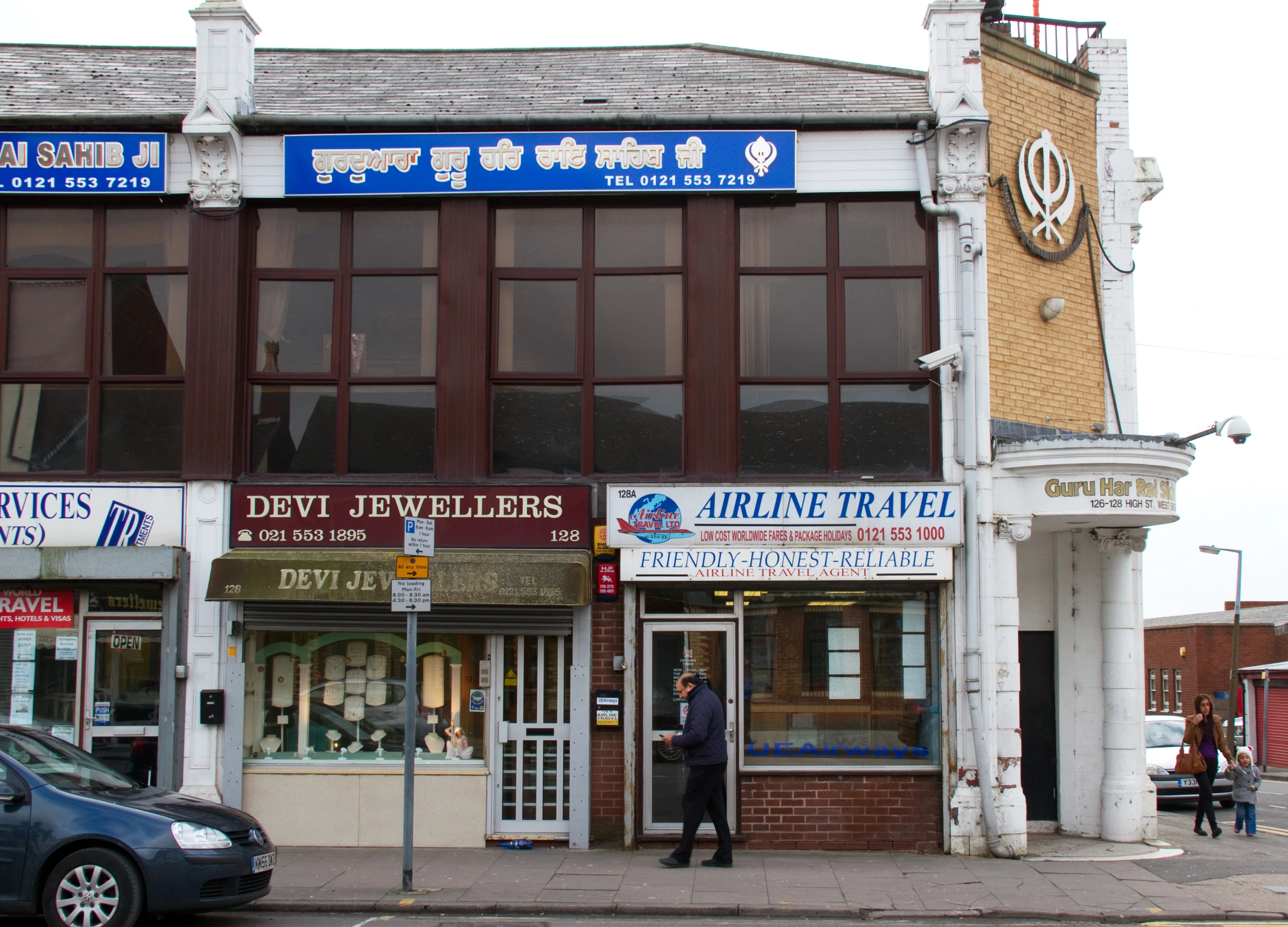 a store front with a police officer standing in front