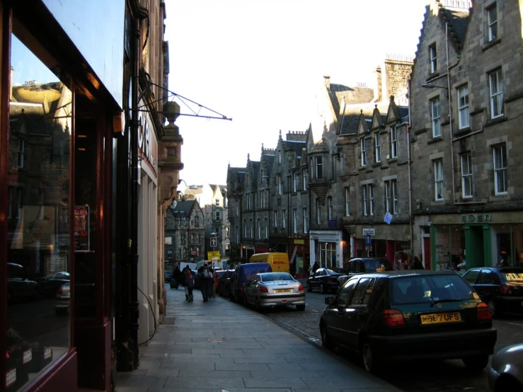 people walking by the street in a city