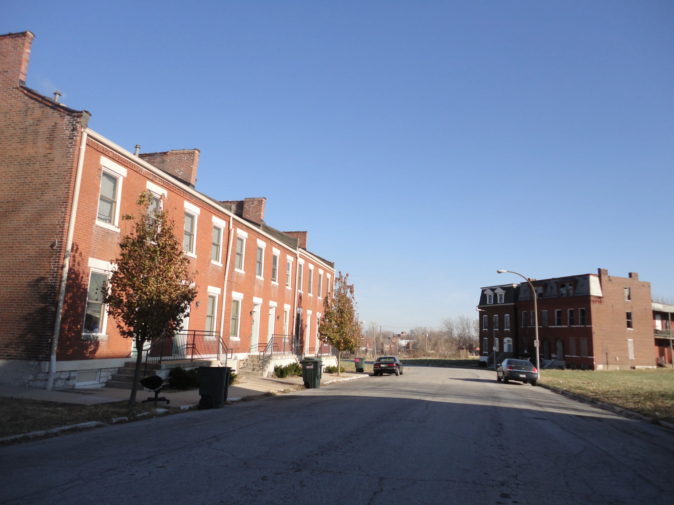 the road and buildings make it appear to be empty from cars