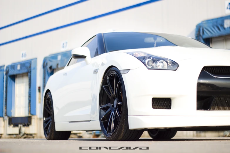 the front view of a white sports car