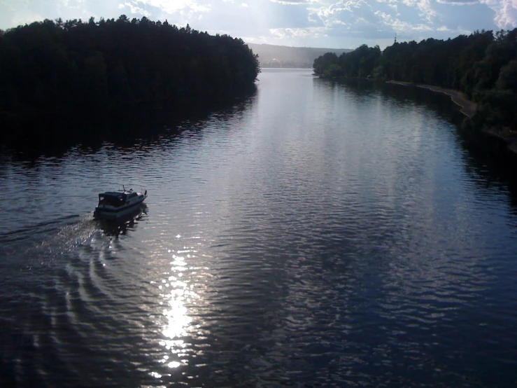 there is a boat moving through the water