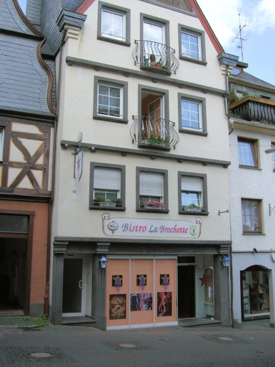 there is a shop that sells flowers on the street