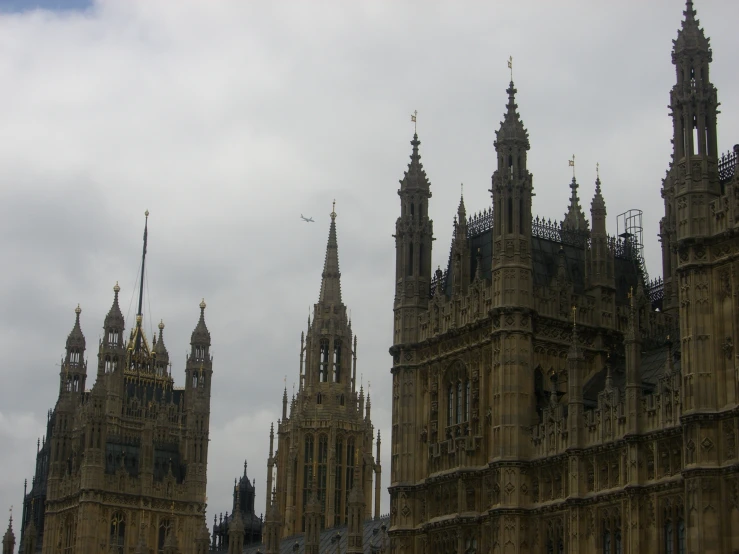 the top of a large building with clocks on it