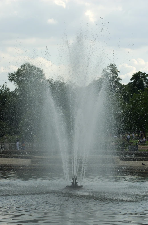 a large fountain spraying water into the air