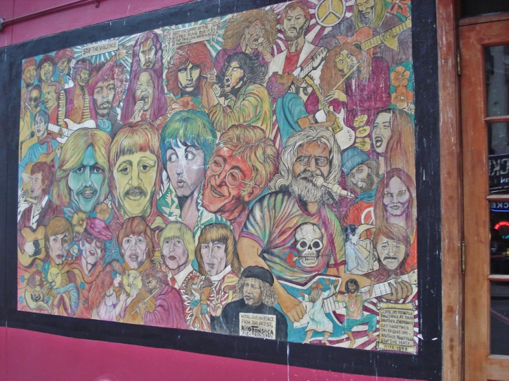 a brightly colored mural with a bunch of different people