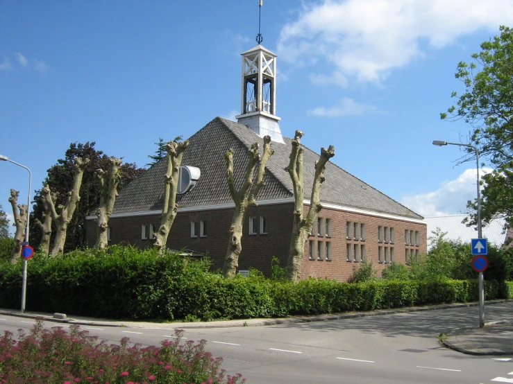 a church with a clock tower is shown