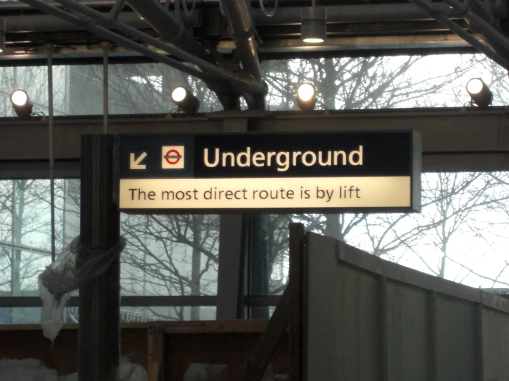 there is a underground sign in the picture