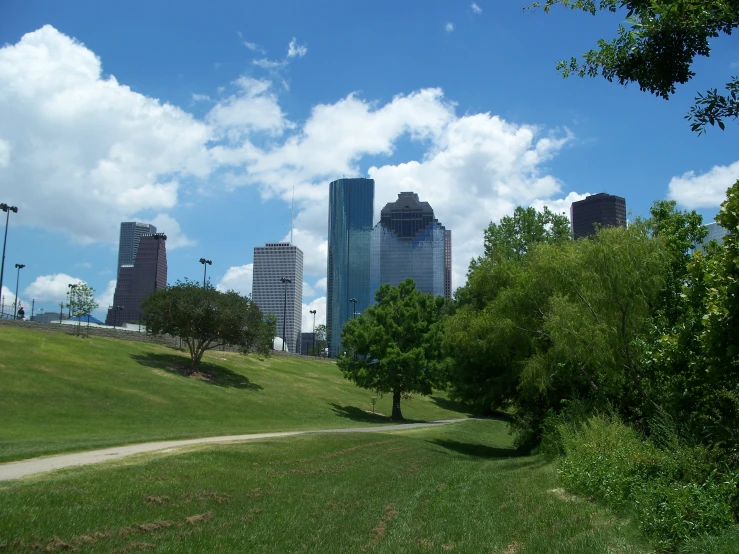 a view of some tall buildings sitting in the distance