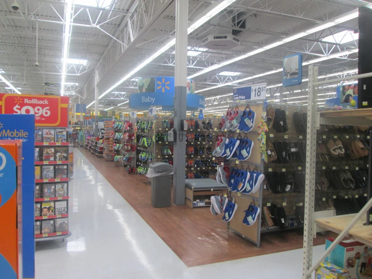 the store has a very wide array of shoes on the shelves