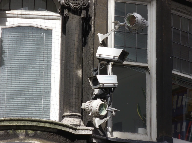 satellite dish antennas in a window of a building