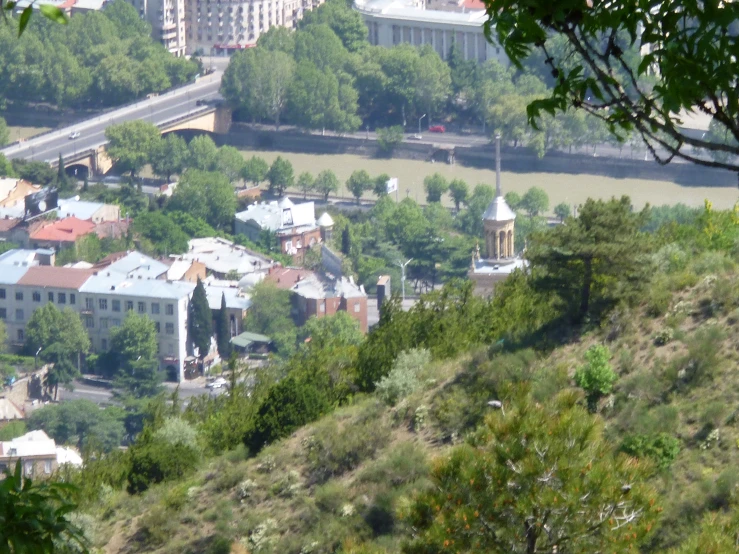 view of the town from above with trees