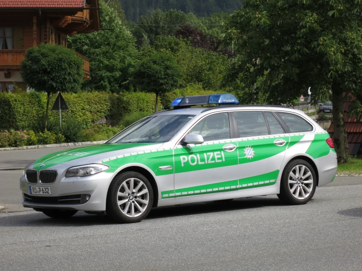 an electric police car parked in the street