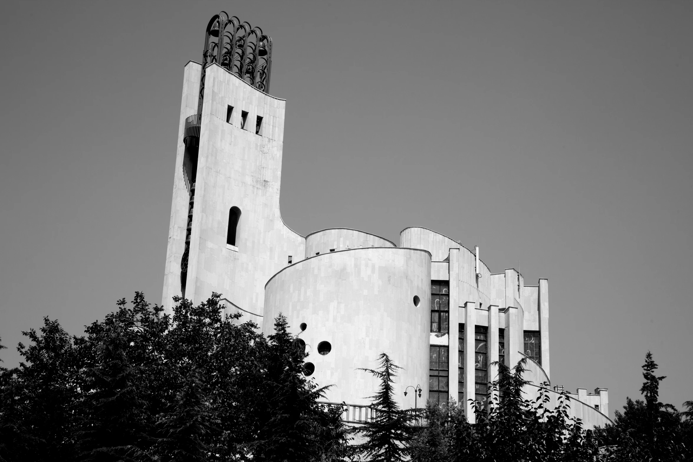 an old building sits tall with a clock on it