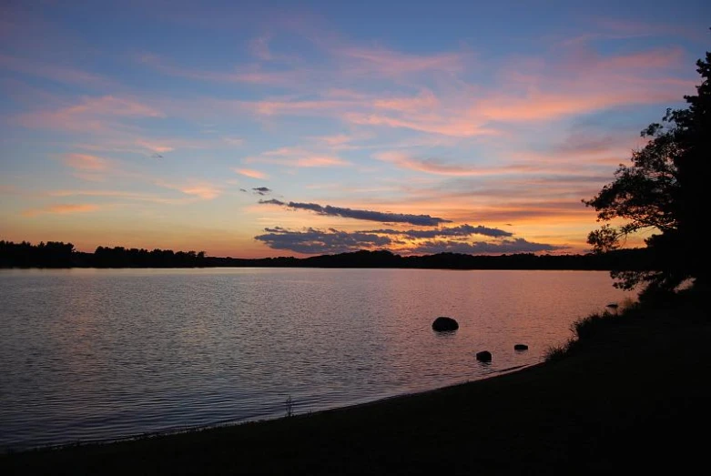 a view of a large body of water during the evening