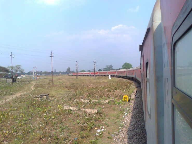 a view out the window of a moving train