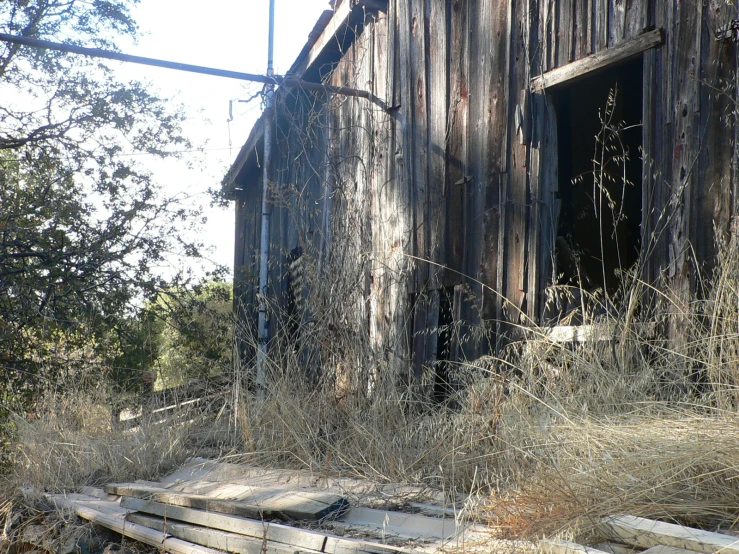 a weathered building that is made of wood