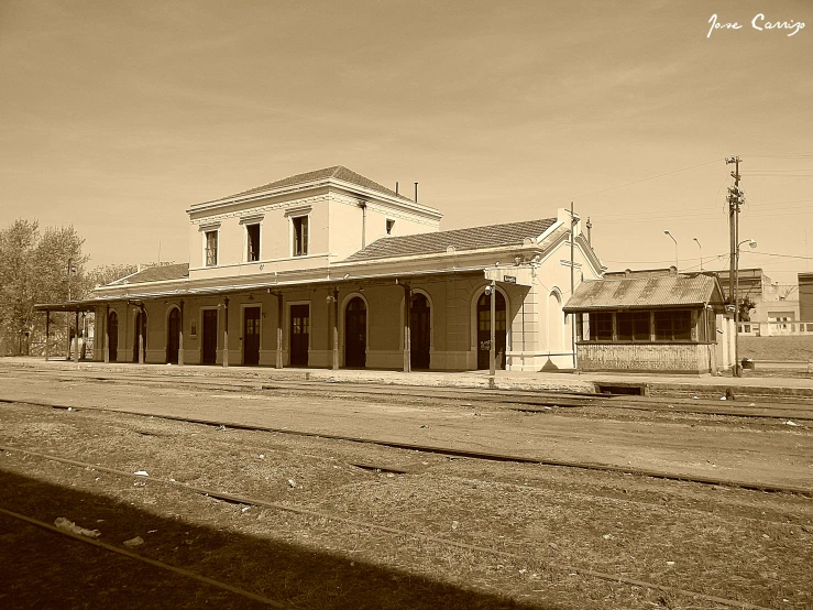 an old train station with the roof over exposed