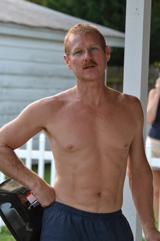 an image of a man with  holding a skateboard