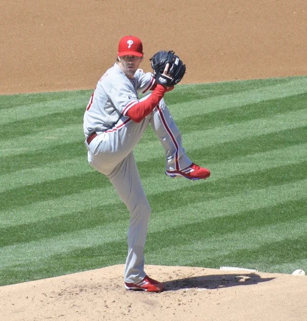 a pitcher on the mound at a baseball game