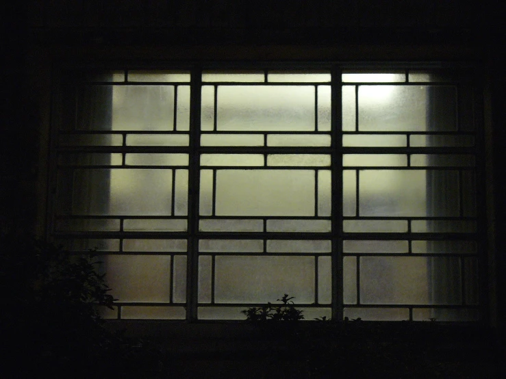 there are many windows lit up in the dark