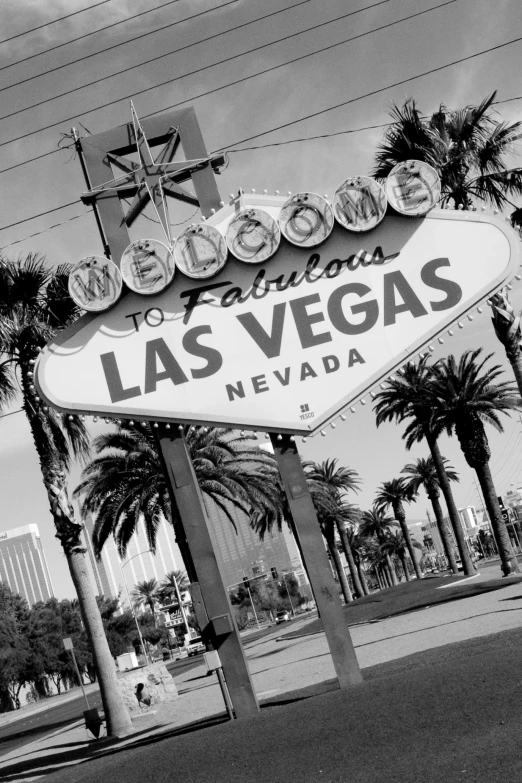 the famous sign is lit up in the evening