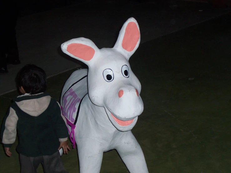 a mascot of a donkey for s playing at night
