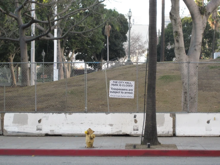 a sign is posted near the road, that reads, it is closed