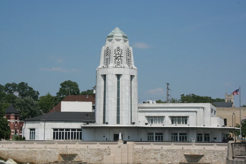 a building is on the bank of water