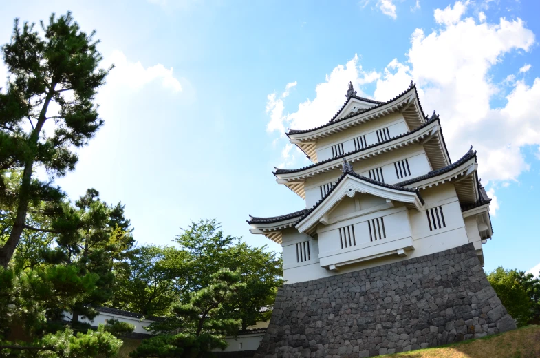 a very tall building that is built on top of a wall