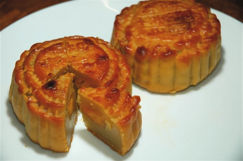 the mooncakes are prepared and cut up on the plate