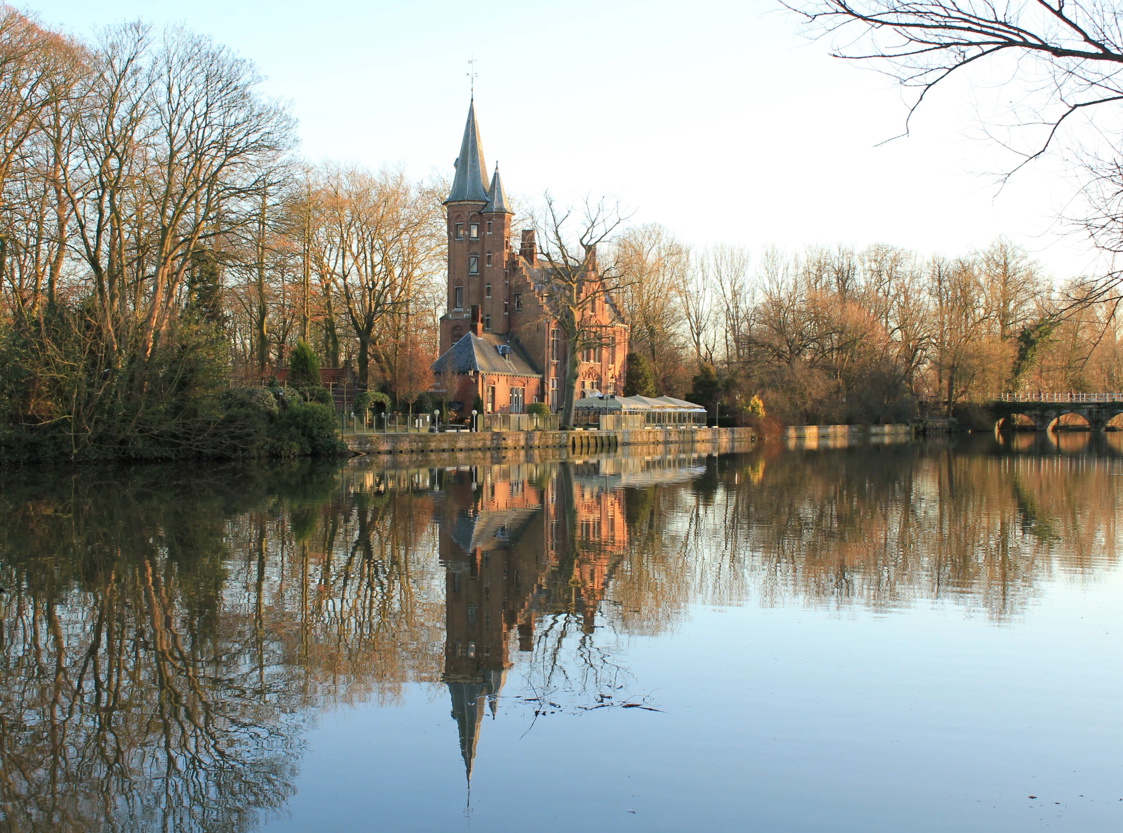 reflection of a building on a body of water