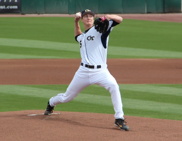 a baseball player has his hand on the side