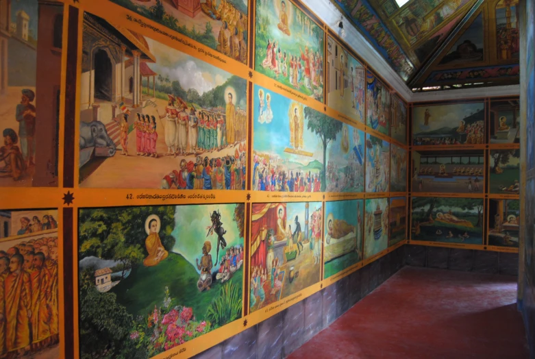 a wall with paintings of different countries on it