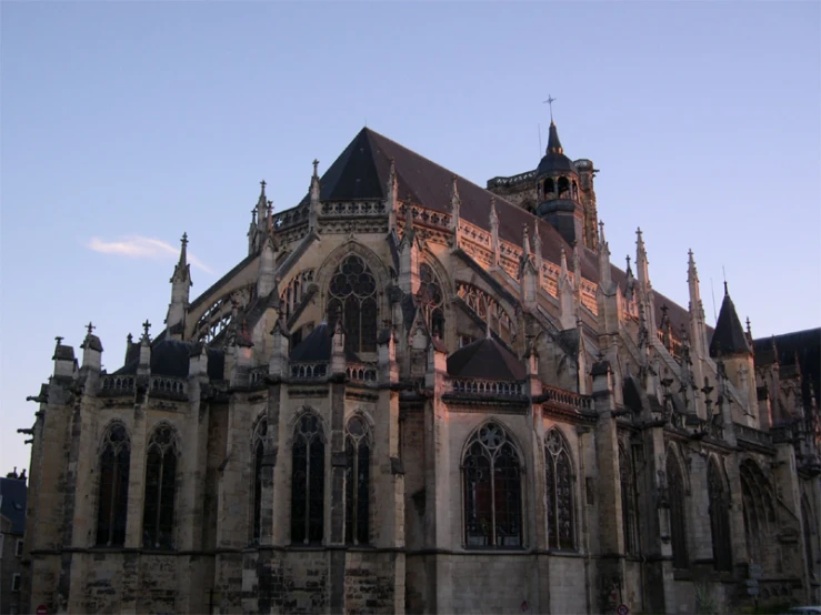 an old looking church that has a lot of spires