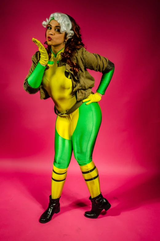 a woman in a green and yellow suit