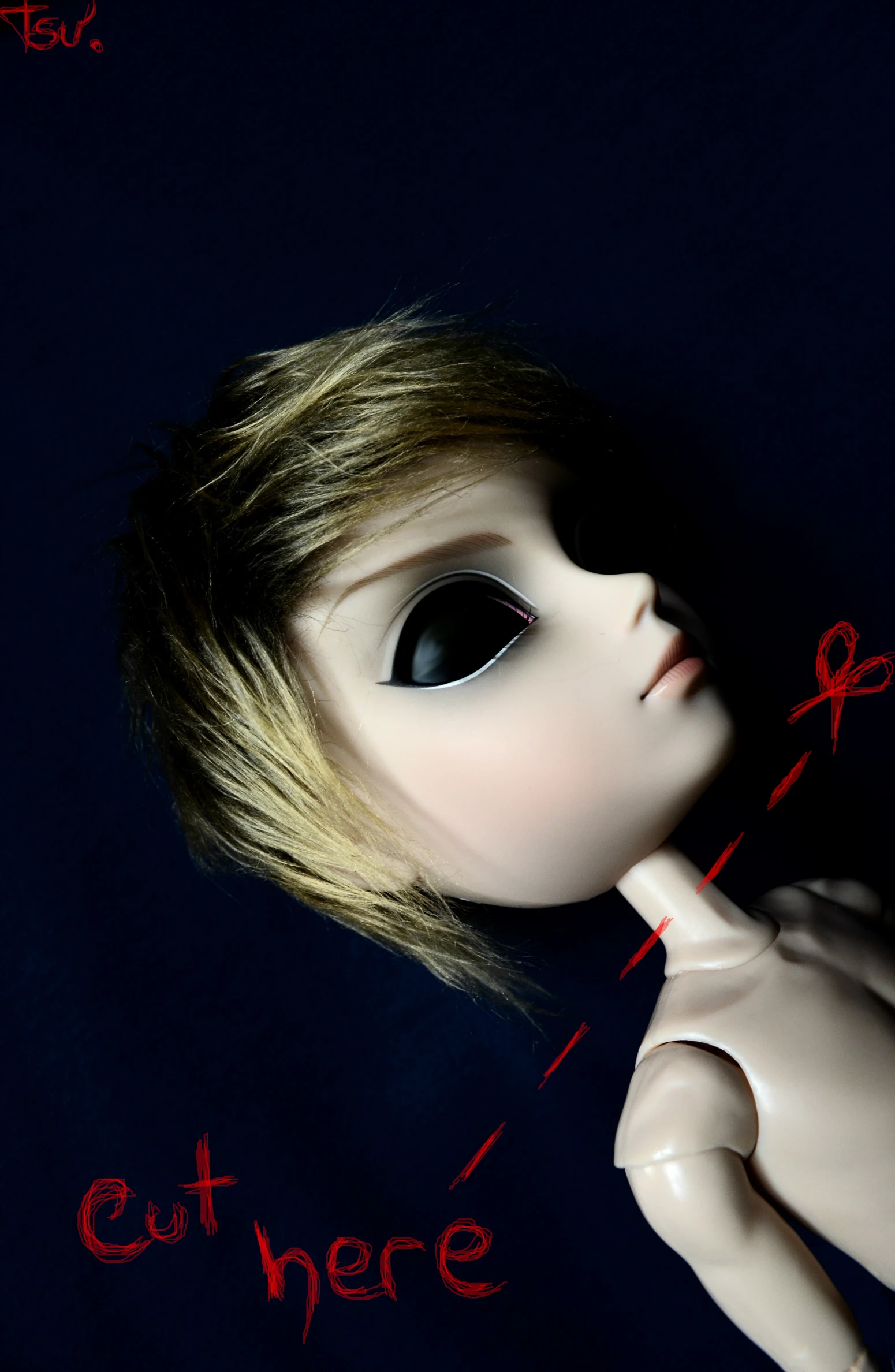 a very cute doll with blond hair