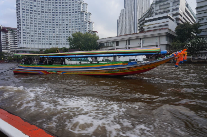 a boat that is going down the river