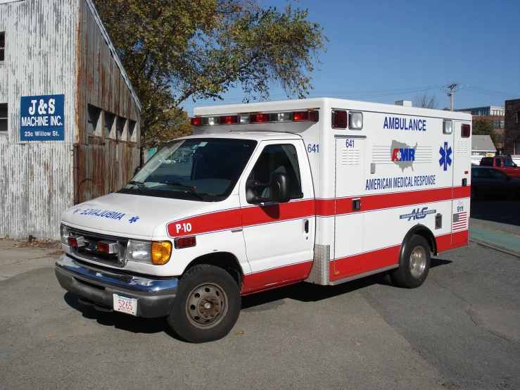 an ambulance parked on the side of a street